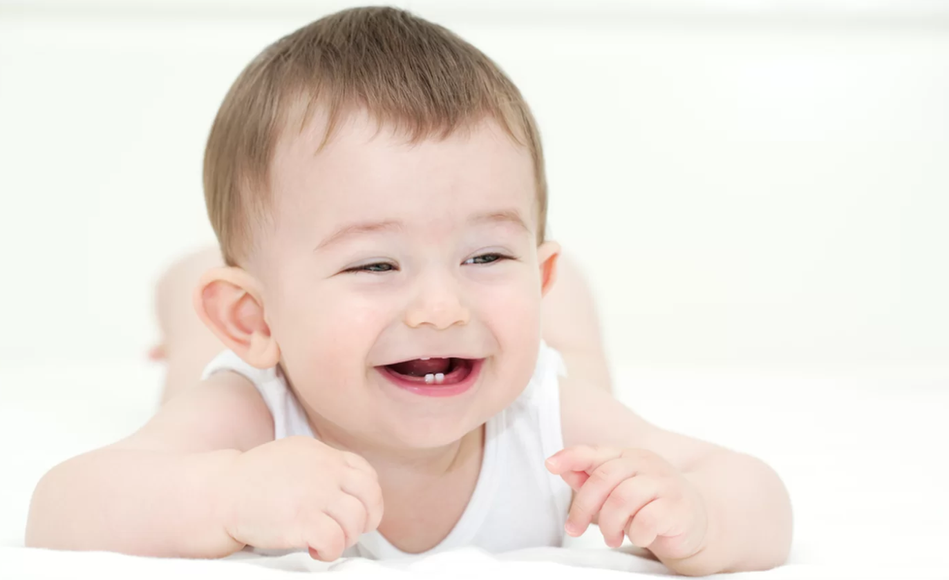 Trẻ chậm mọc răng phải làm sao